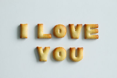 High angle view of cookies against white background