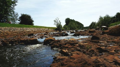 Scenic view of river against sky