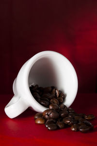 Close-up of coffee beans on table