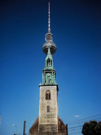 Low angle view of building against blue sky