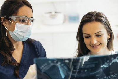 Dentist and patient in medical clinic