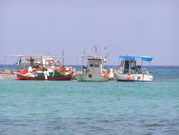 Nautical vessel on sea against clear sky