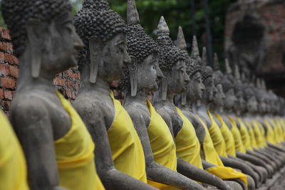 Buddha statues in row at ayutthaya kingdom