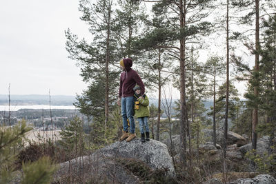 Father and son hiking and enjoying the beautiful view together