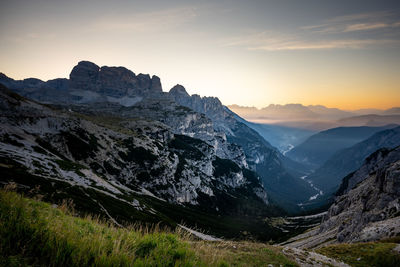 Scenic view of mountains against sky during sunset