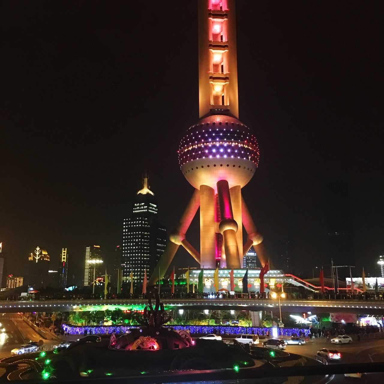 illuminated, night, architecture, built structure, long exposure, city, building exterior, travel destinations, lighting equipment, famous place, capital cities, international landmark, glowing, multi colored, motion, light trail, low angle view, tourism, travel, light - natural phenomenon