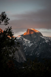 Scenic view of mountains against sky during sunset