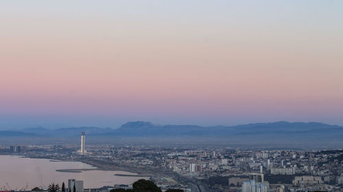 High angle view of townscape against sky during sunset