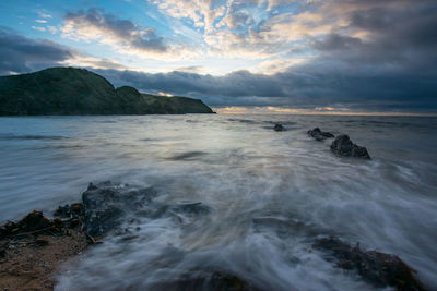 Scenic view of sea against sky during sunset