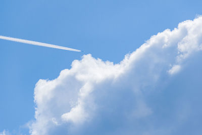 Low angle view of vapor trail in sky