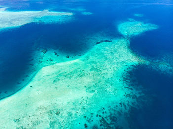 High angle view of rocks in sea