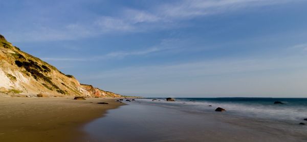 Scenic view of beach against sky