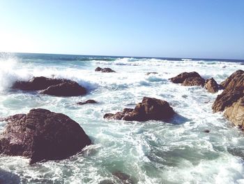 Scenic view of sea against clear sky