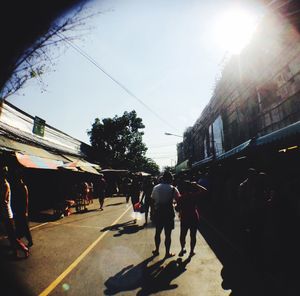 People on road in city