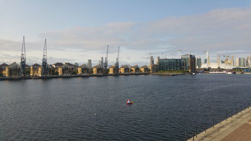 View of buildings in city at waterfront