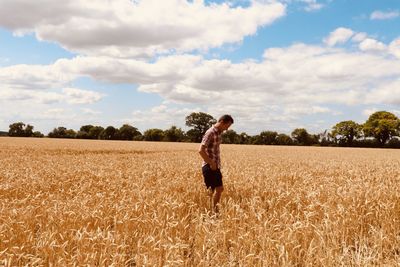 Full length of man standing on field