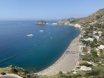 High angle view of bay against clear sky