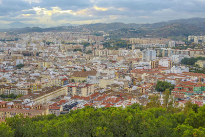 Aerial view of townscape against sky