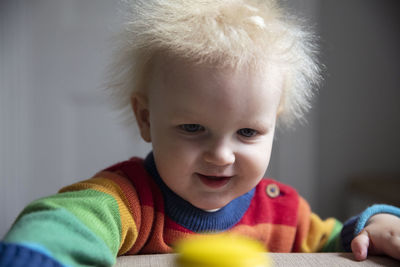 Portrait of cute boy at home