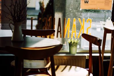 Empty table and chairs at cafe