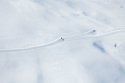 Person skiing on snow covered land
