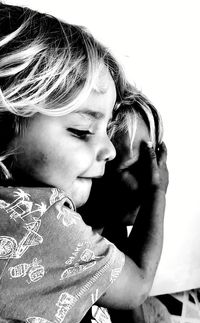 Close-up portrait of a girl looking down