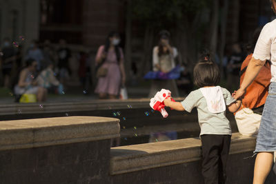 A little girl playing outside