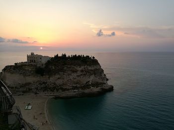 Scenic view of sea against cloudy sky