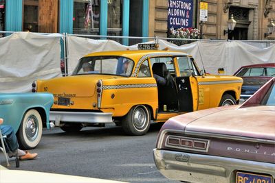 Cars on road in city