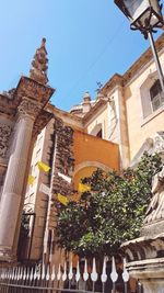 Low angle view of historic building against sky