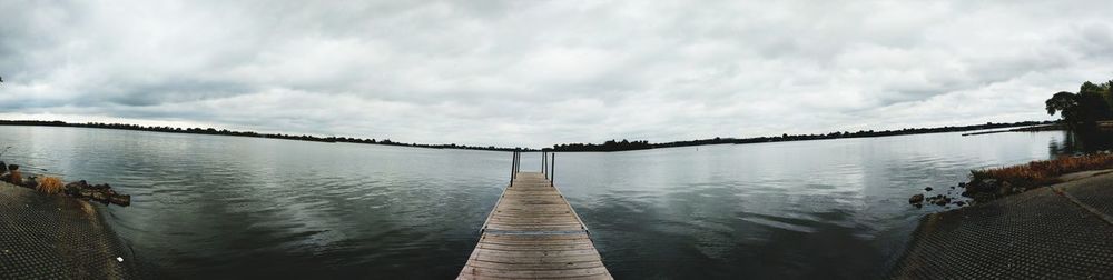 Panoramic view of bridge over river against sky