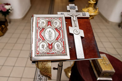 High angle view of cross on table