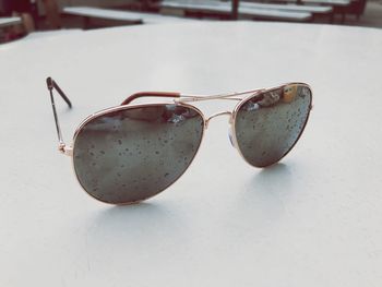 Close-up of sunglasses on table