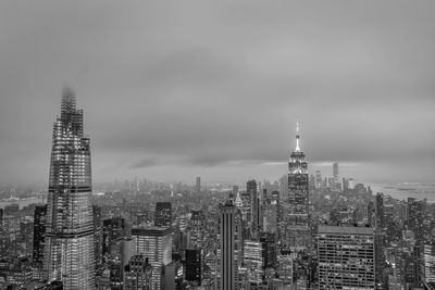 Modern buildings in city against sky