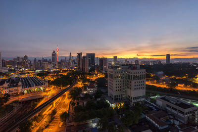 High angle view of cityscape against sky during sunset