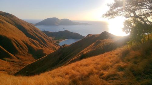 Scenic view of landscape against sky during sunset