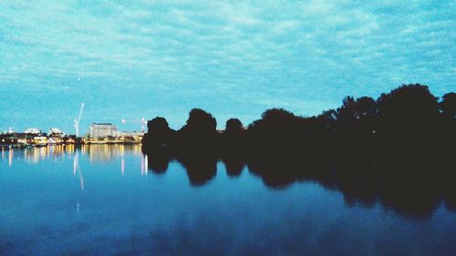 Reflection of clouds in calm lake