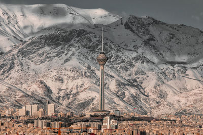 View of buildings in city during winter