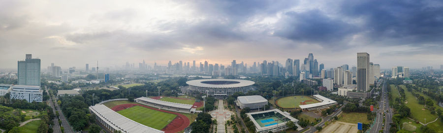 High angle view of modern buildings in city against sky