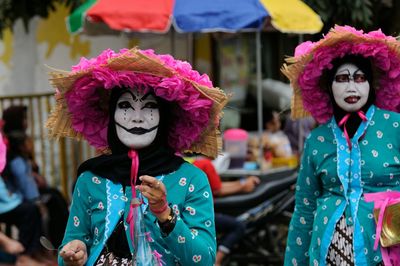 Portrait of female friends with mask
