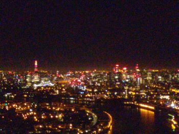 Illuminated cityscape at night