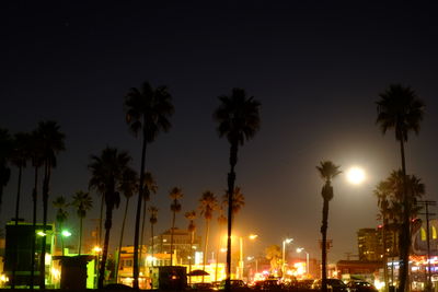 Low angle view of illuminated building at night