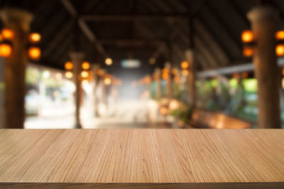 Close-up of illuminated table in restaurant