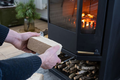 Cropped hand of person preparing food