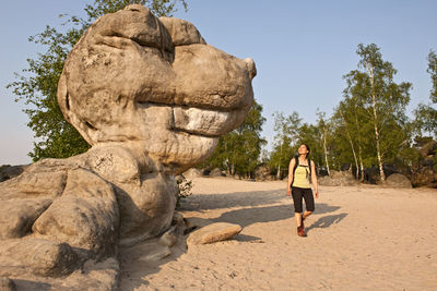 Mature woman exploring the forest of fontainebleau close to paris