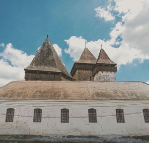 Low angle view of historic building against sky