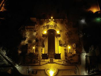 Low angle view of illuminated building at night