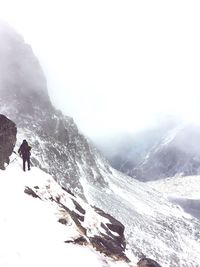 Scenic view of snow covered mountains