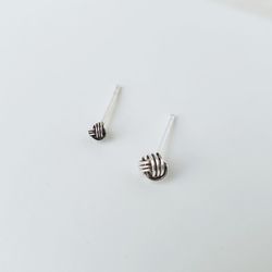 High angle view of metallic object over white background