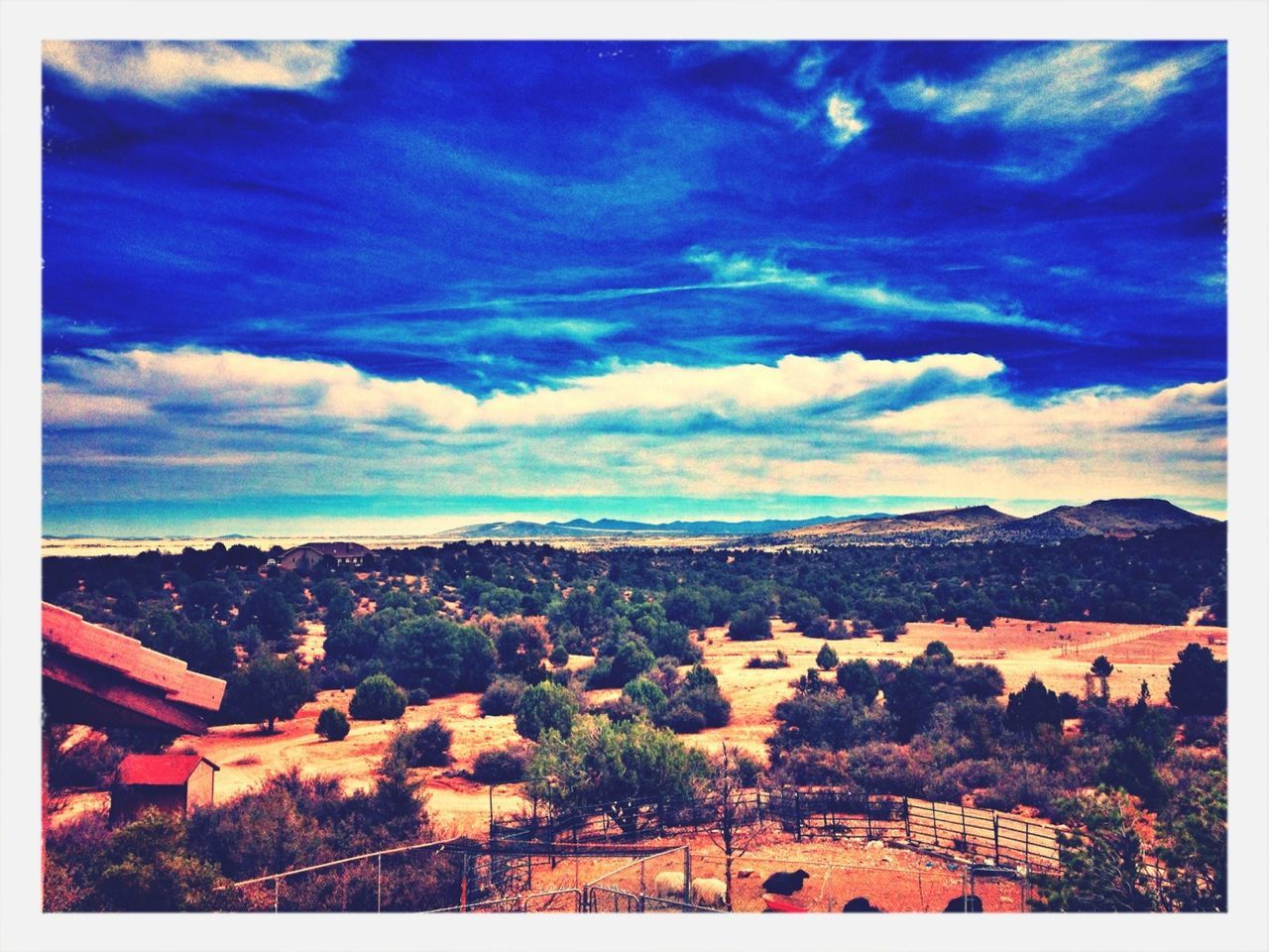 transfer print, auto post production filter, sky, landscape, cloud - sky, mountain, building exterior, tree, built structure, scenics, architecture, house, high angle view, cloud, beauty in nature, nature, tranquil scene, town, tranquility, residential structure